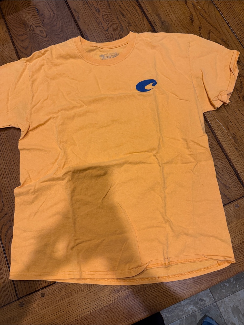 Costa Short Sleeve Tee in Orange with Blue Logo